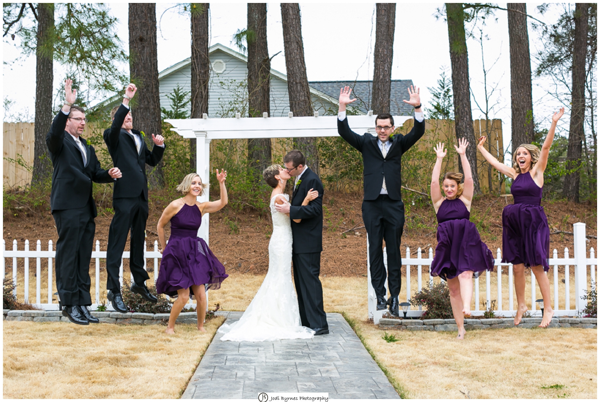 Wedding party jumping