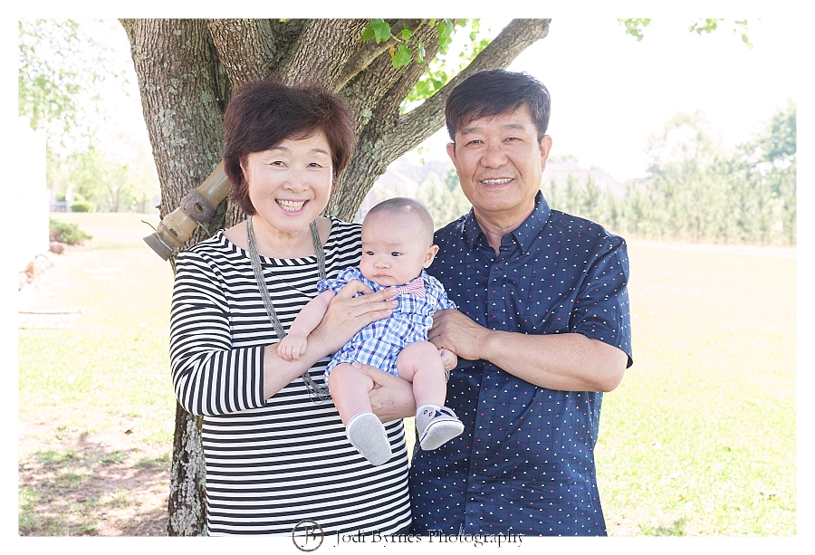 grandparent and baby portrait