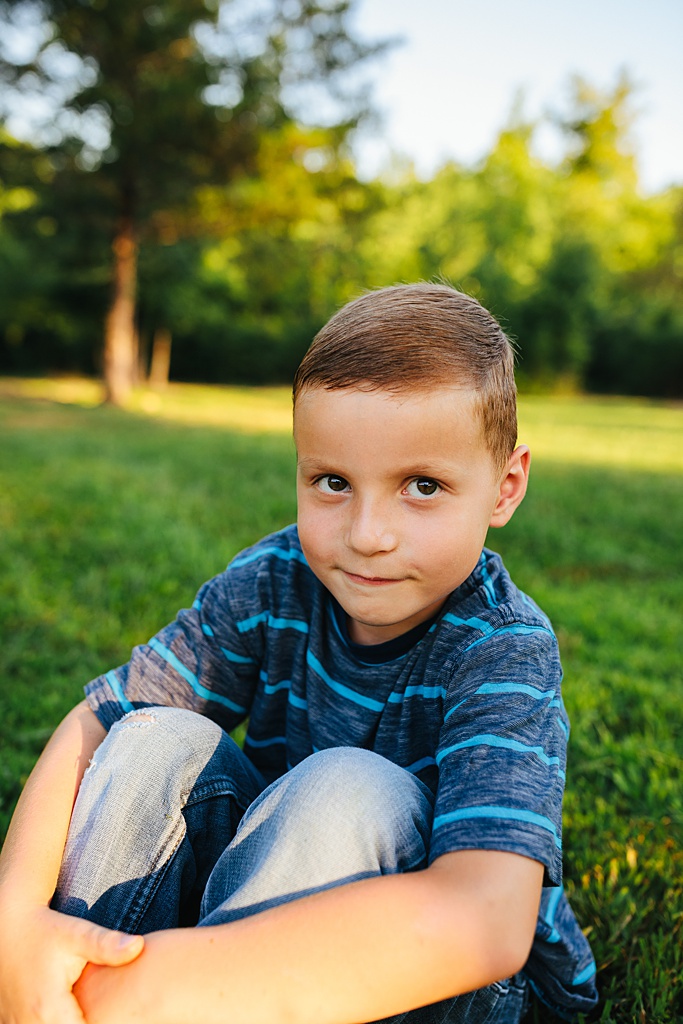 sitting boy smiling